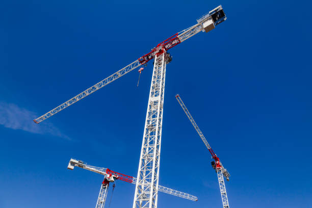 istock Tower crane against the blue sky - construstion concept 1070980466