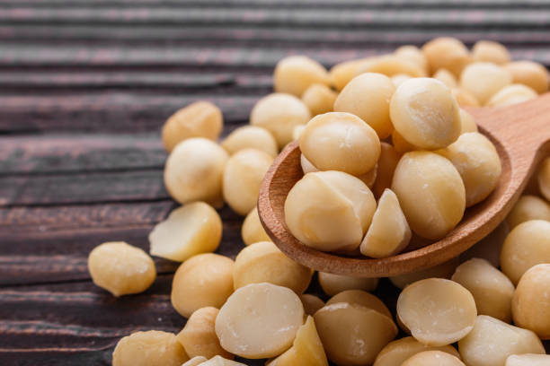 istock delicious macadamia nuts on a wooden rustic background 1070980814