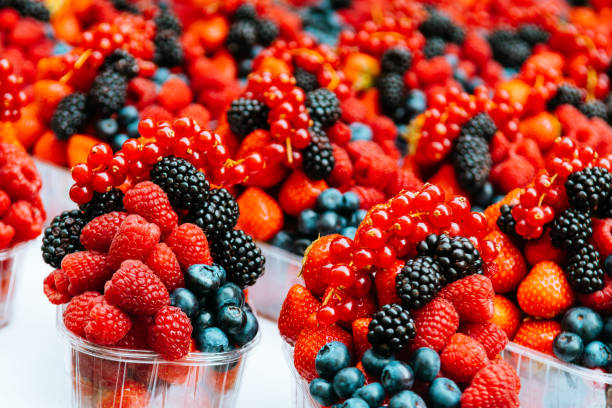 istock closeup of raspberry and blueberry fruits 1070983462