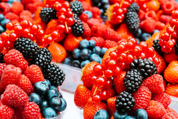 istock closeup of raspberry and blueberry fruits 1070983484