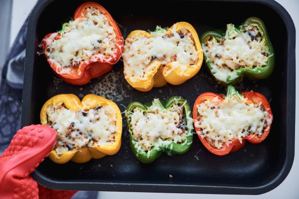 istock Stuffed colorful peppers with rice and vegetables 1070985104