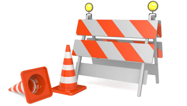 istock Road closed sign with traffic cones 1070987416
