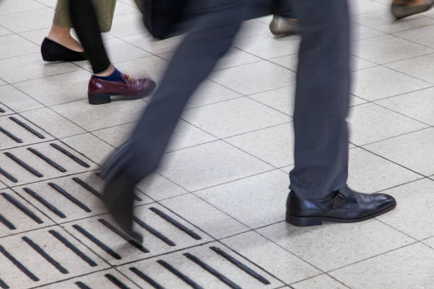 istock Blur business people walking in train station blur motion. 1070987668