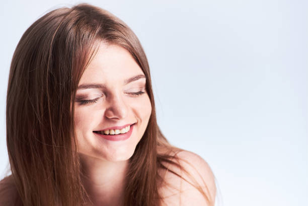 istock Studio portrait of young woman 1070990980