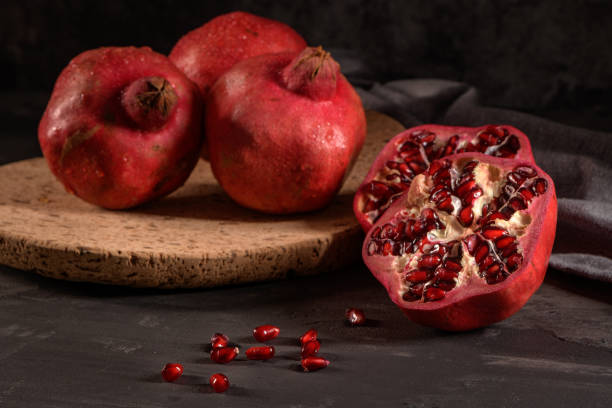 istock Ripe pomegranate and seeds 1070995236