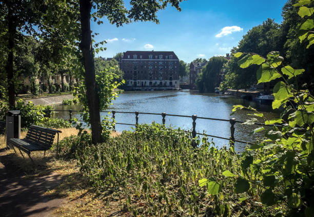 istock park and lake and big building 1070995738