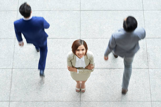 istock Businesswoman during work day at office 1071002922