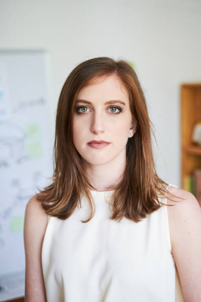 istock Young elegant businesswoman in office 1071004198