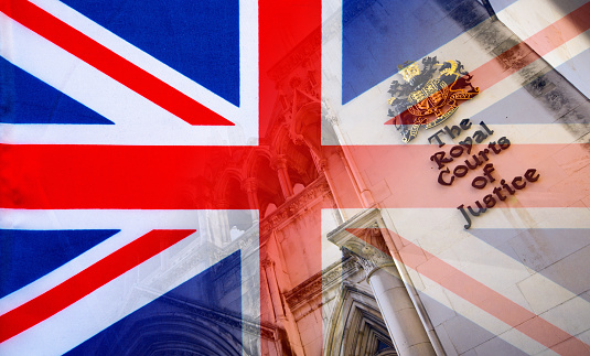 The Royal Courts of Justice blended with a UK Union flag.