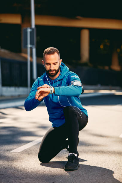 istock Man checking heart beat on smart watch. 1071010856
