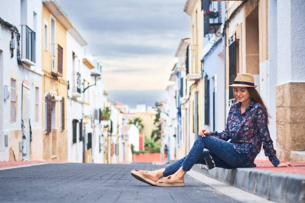 istock Young woman enjoying her vacations in Spain 1071022328