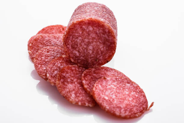 istock delicious sliced salami on a white background 1071025030