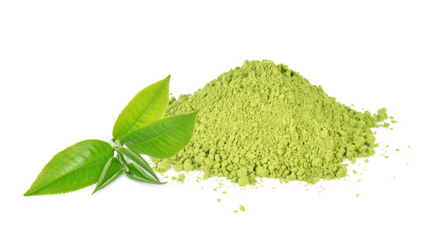Green tea leaf and matcha powder isolated on white background Green tea leaf and matcha powder  isolated on white background. chlorella stock pictures, royalty-free photos & images