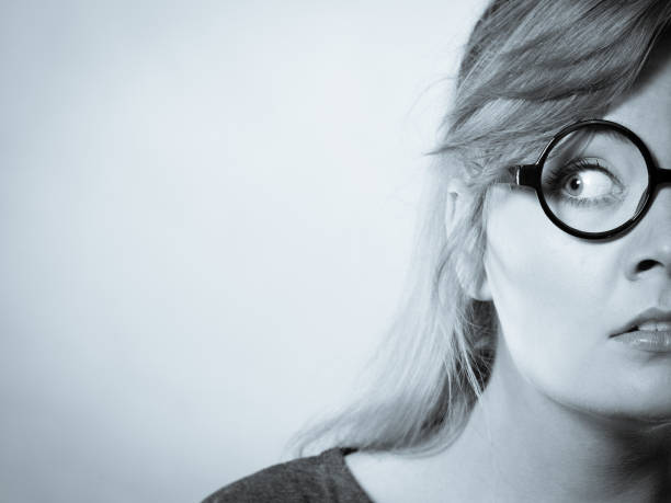 istock Scared girl in glasses. 1071037438