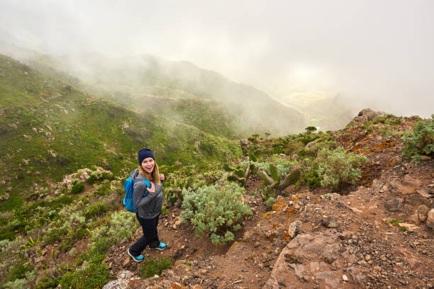 happy hiker woman - conquering adversity wilderness area aspirations achievement imagens e fotografias de stock