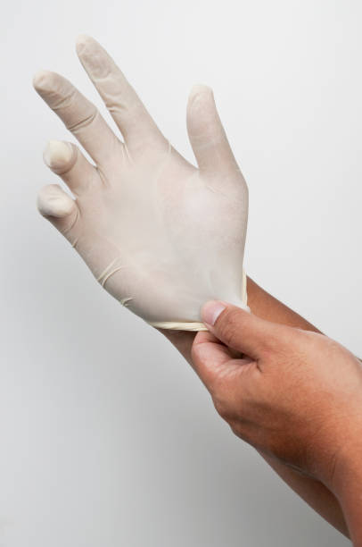 istock Man hand wearing safety glove 1071039320