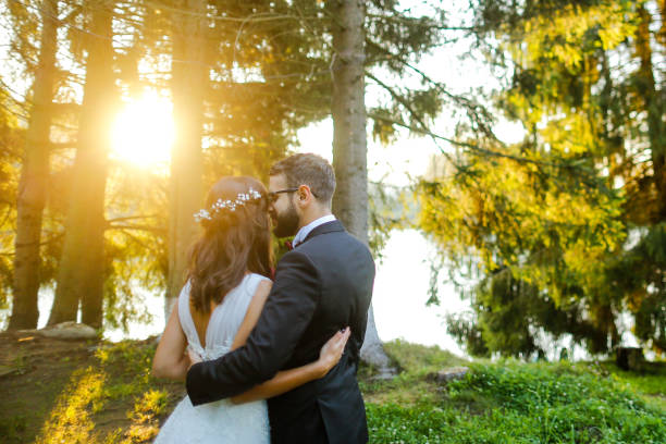 istock Beautiful wedding couple posing in nature 1071040308