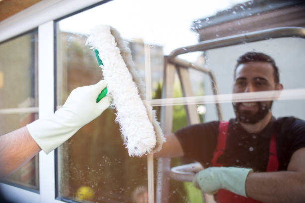 istock Window cleaner doing his job carefully 1071046700