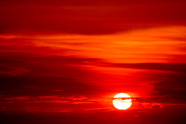 istock last light sunset on  sky orange cloud ray around sun 1071046838