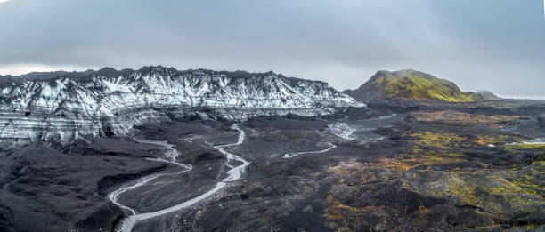 istock Panorama view of glacier against sky in winter. 1071051726