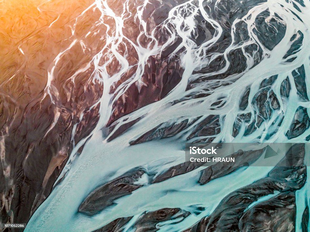 Aerial view of braided river. Aerial view of braided river. Scenic view of Markarfljot in Iceland. Image is representing beautiful nature. Glacier river from Eyjafjallajokull. Aerial View Stock Photo