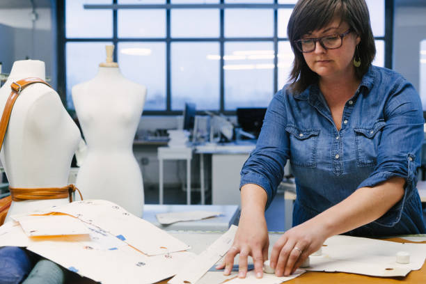istock Fashion designer working in her studio. 1071052616