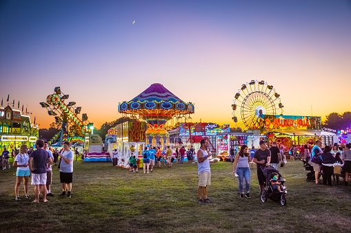 West Windsor, NJ - USA - September 23, 2017: Amusement park rides and plenty of people attended The 18th Annual Mercer County Italian American Festival in West Windsor NJ.