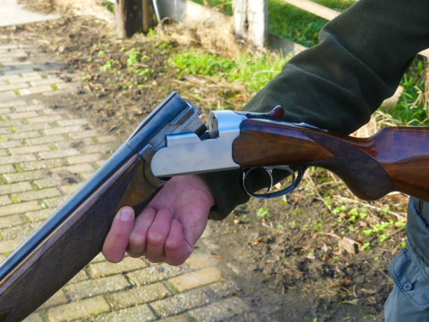 istock hunter with shot gun close up 1071057336