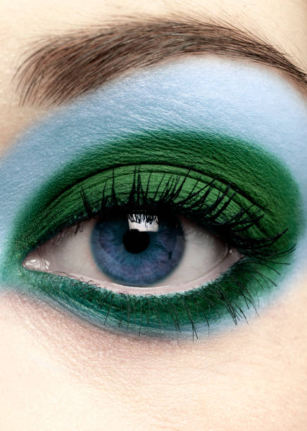 istock blue eye with light blue and green eyeshadow close-up 1071065644