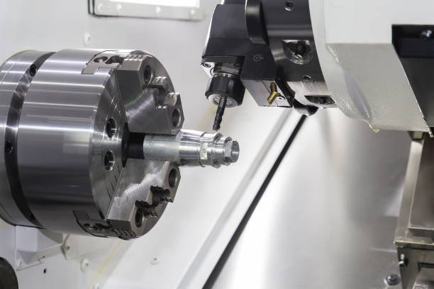 istock Steel metal cutting machine process by CNC lathe in workshop 1071066250