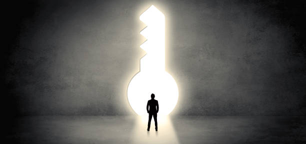 istock Businessman standing in a big keyhole 1071066392