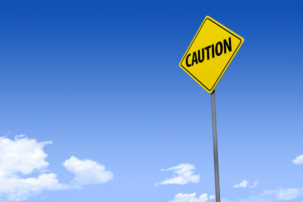 istock 3D Illustration of a road sign _caution_angle2 1071066926