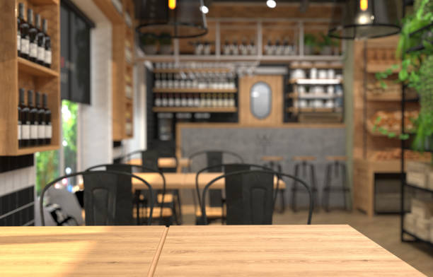 istock Interior of a cafe with a bar counter. Blurred background and table surface in the foreground. 1071068332