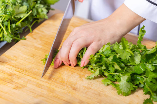 istock Cook chopped green coriander 1071068334