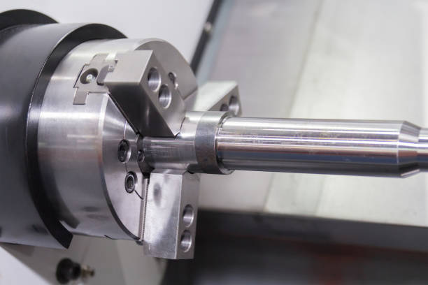 istock Steel metal cutting machine process by CNC lathe in workshop 1071068382