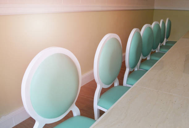istock Tables and chairs in a coffee shop - set  table group dinner / green chairs in the 1071068714