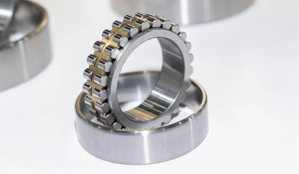 istock High precision machine parts bearing isolate on white background 1071072514