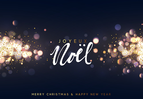 French Joyeux Noel. Christmas background with golden lights bokeh. Xmas greeting card. Magic holiday poster, banner. Night bright gold sparkles background