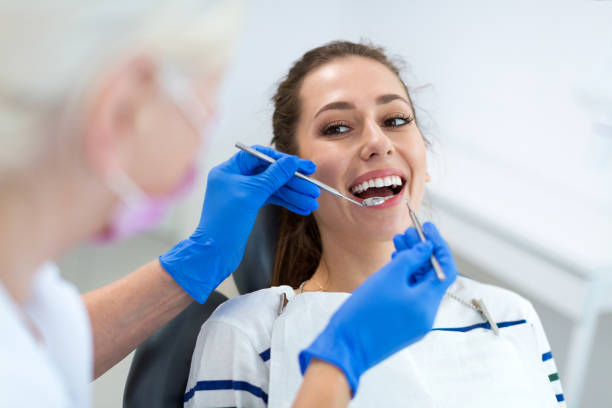 istock Dentist and patient in dentist office 1071079648