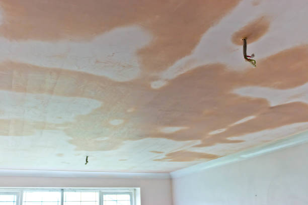 A repair to a fireplace to insert a log burner A repair to a fireplace to insert a log burner. The repair is still wet and just drying out. drywall fireplace stock pictures, royalty-free photos & images