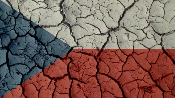 Political Crisis Or Environmental Concept: Mud Cracks With Czech Republic Flag