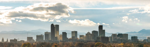 istock Sun Rays Reflected on Glass Buildings in Downtown Denver 1071084878