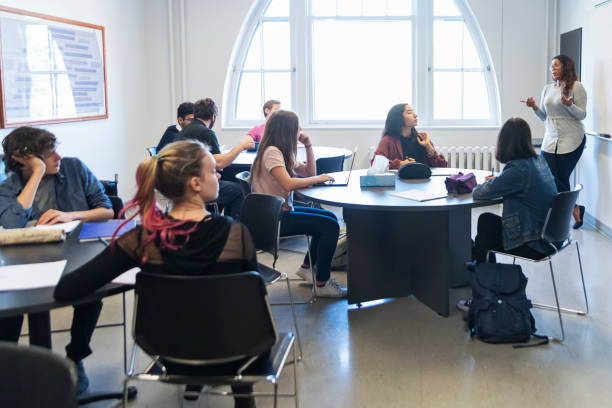 istock Multi-ethnic group of College students in classroom. 1071085600