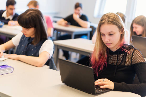 istock Multi-ethnic group of College students in classroom. 1071085704