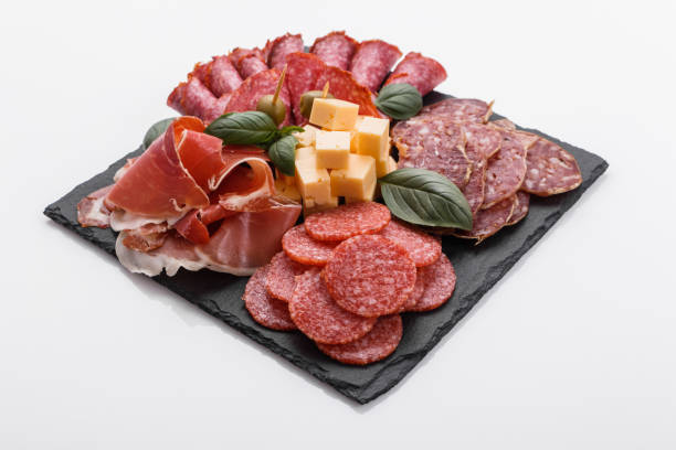 istock Cold smoked meat plate on a white background 1071087660