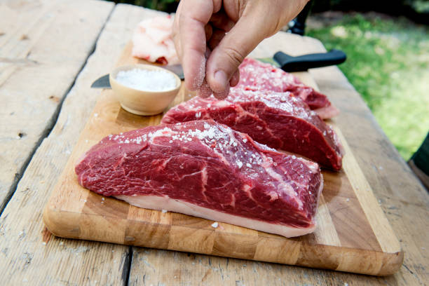 istock Cook salt the meat for the Picanha 1071089846