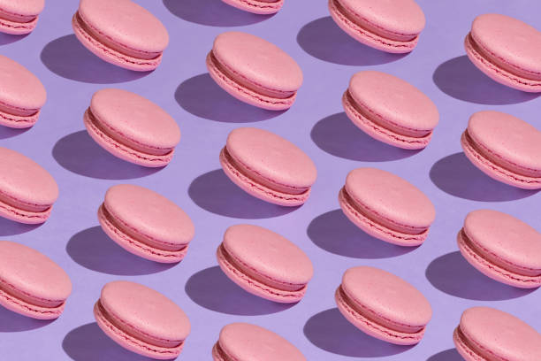 istock Seamless pattern of delicious pink macaroons. 1071091178
