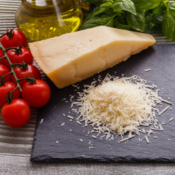 istock fragrant grated Parmesan on a slate stone slicing board 1071096024