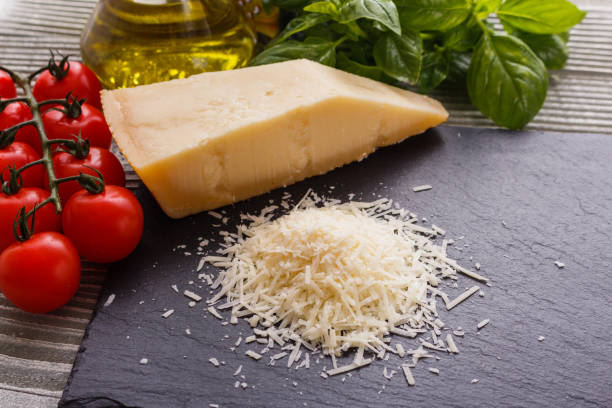 istock fragrant grated Parmesan on a slate stone slicing board 1071096090