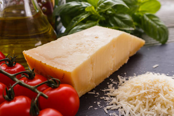 istock fragrant grated Parmesan on a slate stone slicing board 1071096272